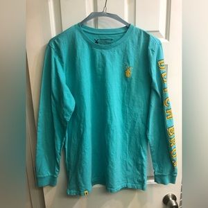 Long sleeve blue Dutch Bros t shirt with sleeve logo, size L